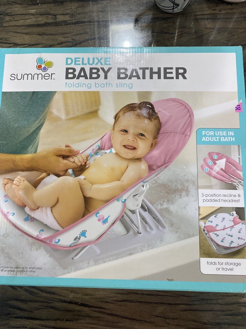 Summer Deluxe Baby Bather Folding Bath Sling (Category: Bathtub & Bath Accessories) located in Manila. Submitted by junjuns. (Listing ID 1440751702, Image 2). Description: - Deluxe baby bather in cute pink animal print. - Features a folding bath sling for added comfort and support. - 3-position recline and padded headrest for optimal baby positioning. - Folds flat for convenient storage and travel. - Designed for use in adult bathtubs. - Makes ba