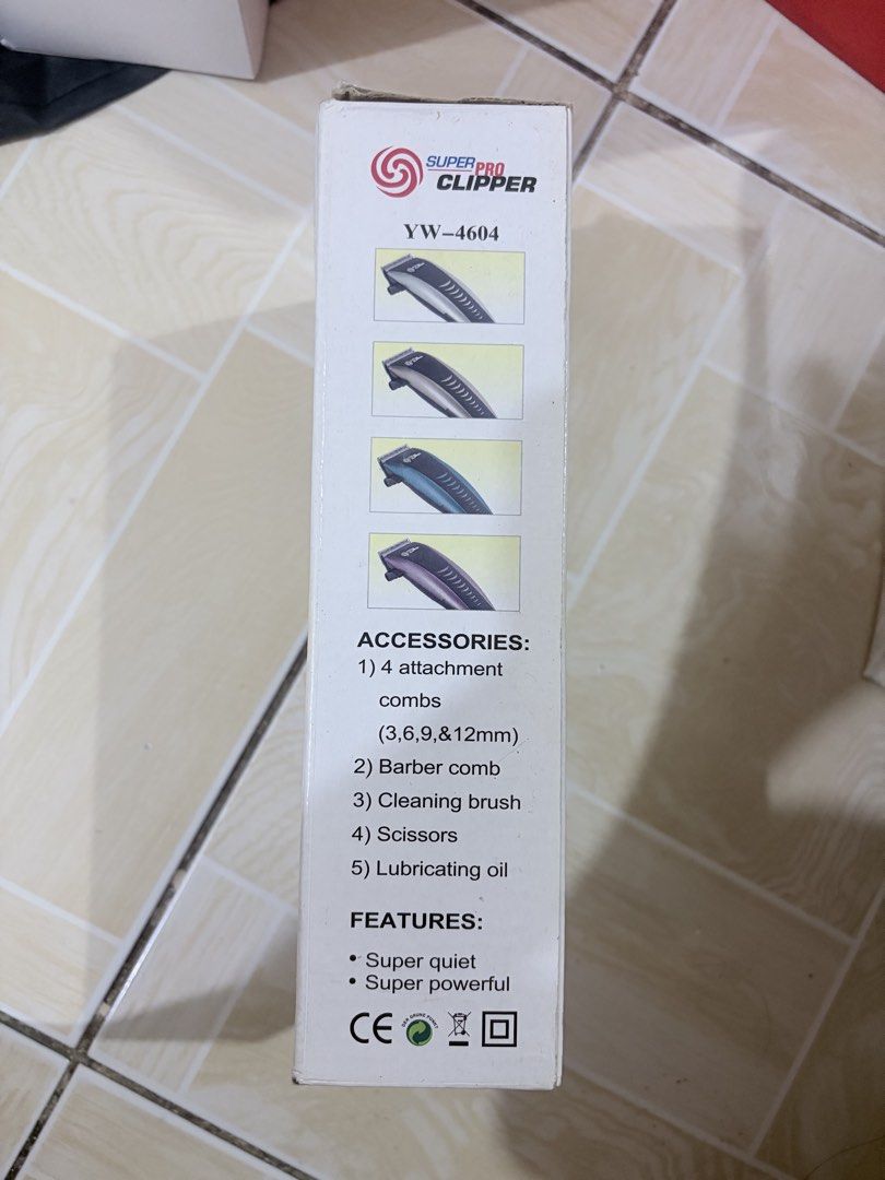 Super Pro Clipper YW-4604 Hair Trimmer Set (Category: Men's Grooming) located in Manila. Submitted by fiercetree-6b01 (Listing ID 1440752015, Image 2). Description: - Super Pro Clipper YW-4604 - Ideal for home haircuts - Super quiet and powerful motor - Includes: 4 attachment combs (3mm, 6mm, 9mm, 12mm), barber comb, cleaning brush, scissors, lubricating oil.