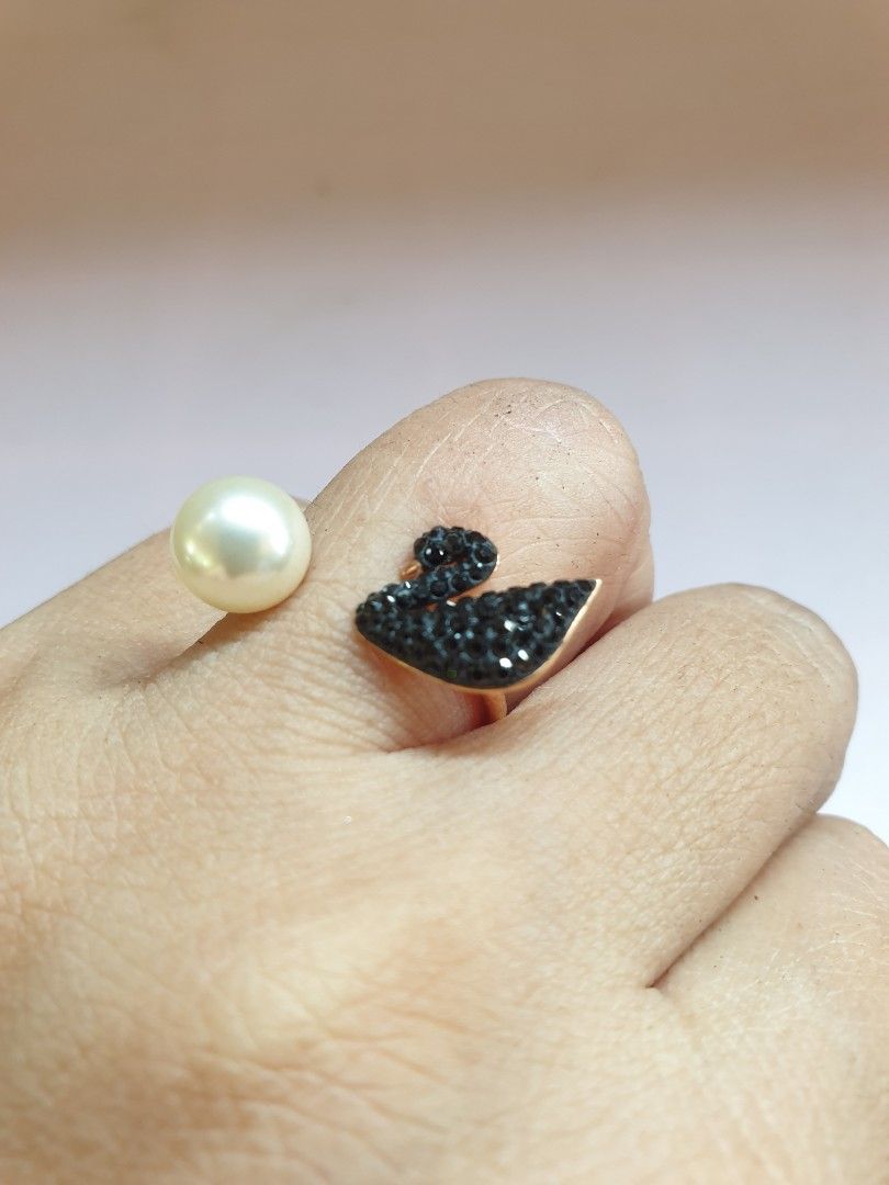 Swarovski Open Ring with Black Swan & Pearl (Category: Rings) located in Las Pinas. Submitted by anggesmart (Listing ID 1440624565, Image 3). Description: BNew Swarovski Open Ring with iconic Black Swan & Pearl Size 5.75 Rose gold tone metal plated With tag, box Accepts bpi & gcash .