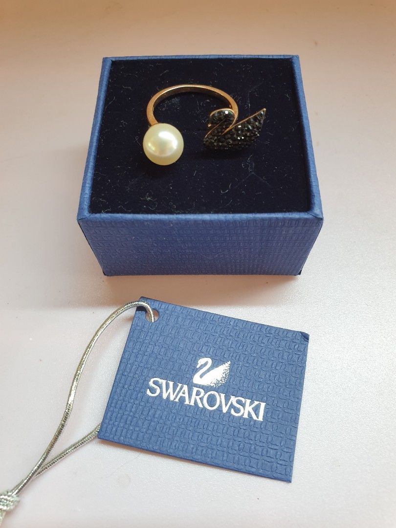 Swarovski Open Ring with Black Swan & Pearl (Category: Rings) located in Las Pinas. Submitted by anggesmart (Listing ID 1440624565, Image 1). Description: BNew Swarovski Open Ring with iconic Black Swan & Pearl Size 5.75 Rose gold tone metal plated With tag, box Accepts bpi & gcash .