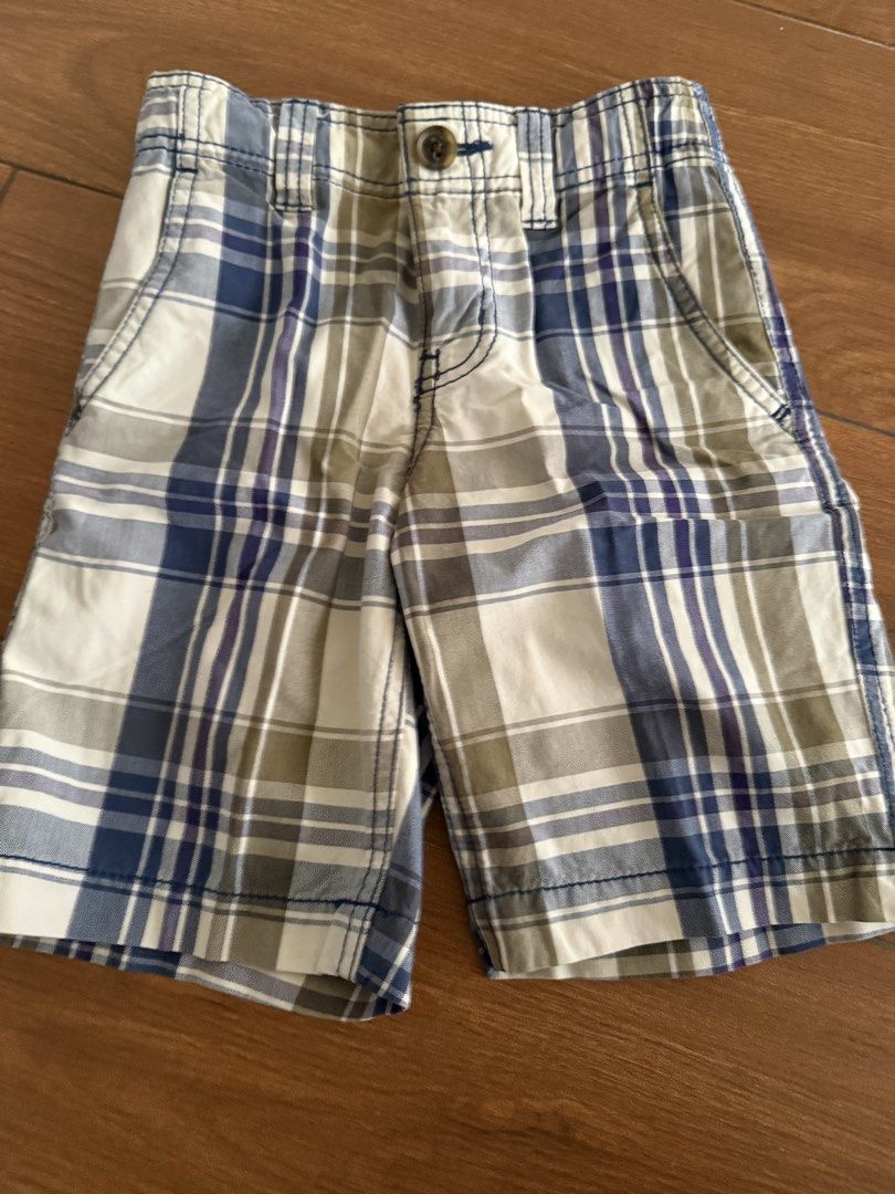 Take all Boys' Plaid and Striped Shorts Bundle (Category: Babies & Kids Fashion) located in Bulacan. Submitted by emjay_17 (Listing ID 1440680270, Image 2). Description: - Bundle of 4 boys' shorts - Includes 2 plaid shorts (blue, beige/green) - Includes 2 striped shorts (green/white, blue/white) - All shorts feature button and zip closure - Ideal for summer wear - Versatile for creating multiple outfits.