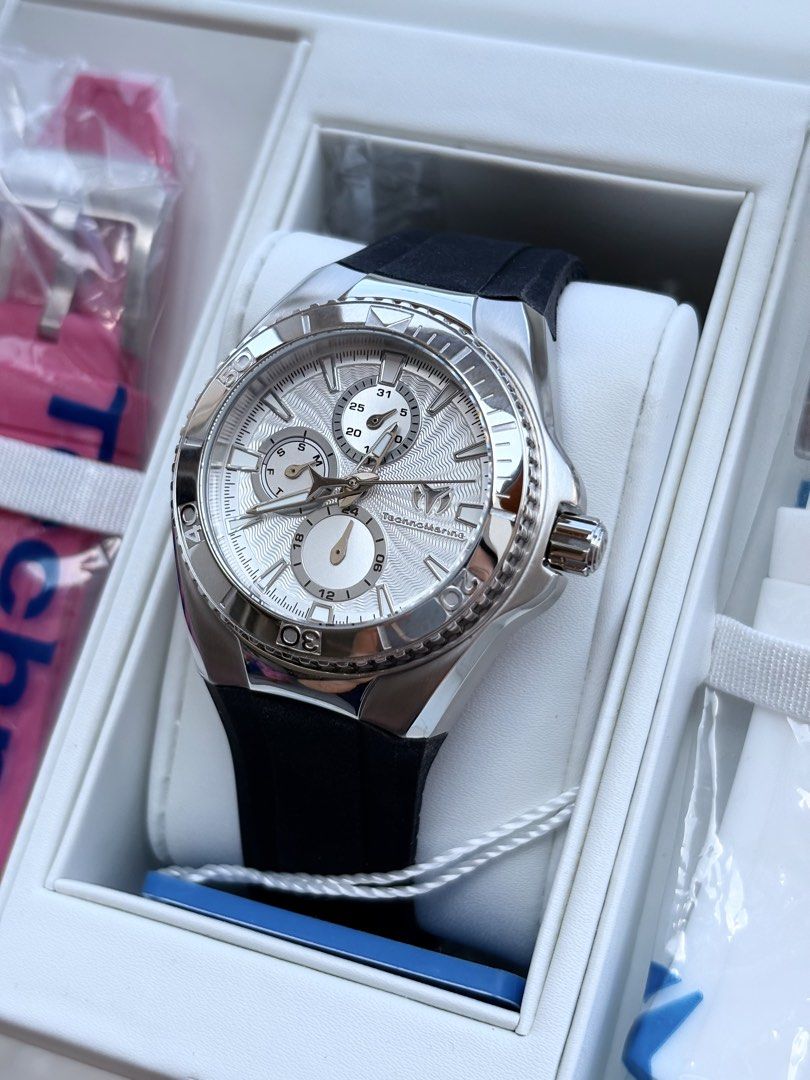 CLEARANCE TechnoMarine Cruise Chronograph Watch with Extra Straps (Category: Luxury Watches) located in Manila. Submitted by eviauthenticwatches (Listing ID 1440595474, Image 2). Description: - TechnoMarine Cruise Watch 40mm - Silver Dial with Chronograph Functions - Comes with Black Rubber Strap (attached) - Includes Additional Pink Strap - Includes Additional White Strap - Water Resistant up to 10 ATM - Reliable Japan Movement - Durable Stainle