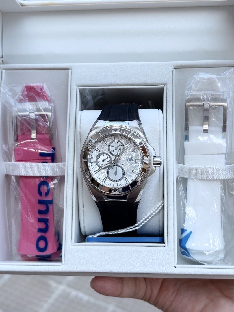 CLEARANCE TechnoMarine Cruise Chronograph Watch with Extra Straps (Category: Luxury Watches) located in Manila. Submitted by eviauthenticwatches (Listing ID 1440595474, Image 1). Description: - TechnoMarine Cruise Watch 40mm - Silver Dial with Chronograph Functions - Comes with Black Rubber Strap (attached) - Includes Additional Pink Strap - Includes Additional White Strap - Water Resistant up to 10 ATM - Reliable Japan Movement - Durable Stainle