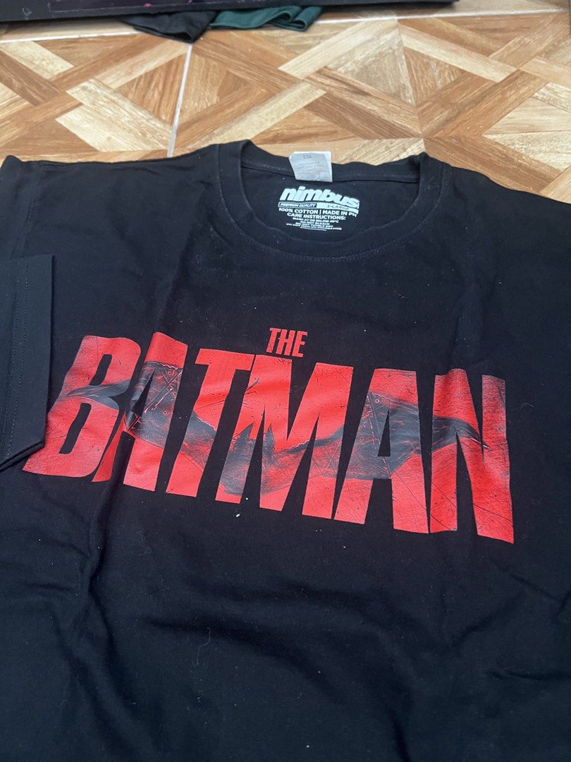 The Batman T-Shirt X-Large Black (Category: Tshirts & Polo Shirts ) located in Manila. Submitted by dommnc (Listing ID 1440621005, Image 2). Description: - Black t-shirt with 'The Batman' graphic print - Made from 100% cotton - Tagged as X-Large - Ideal for fans of the movie - Care: Wash below 40°C, no bleach, no tumble dry, do not iron on print 200 for 1 300 for both.