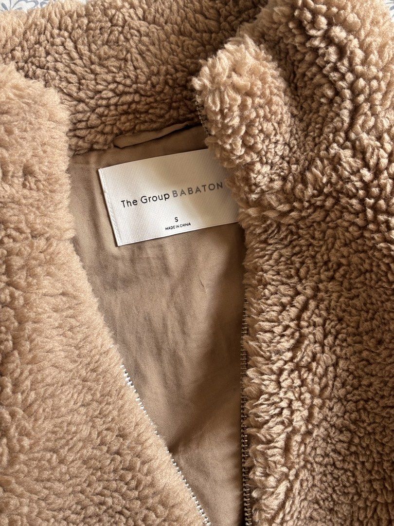 The Group Babaton Teddy Fleece Bomber Jacket Size S (Category: Coats, Jackets and Outerwear) located in Pasig City. Submitted by mariks (Listing ID 1440689543, Image 3). Description: - Super cozy teddy fleece jacket - Brand: The Group Babaton - Style: Cropped bomber - Features: Zip-up front, ribbed cuffs and hem - Ideal for: Layering, cooler weather - Size: S - No issue.