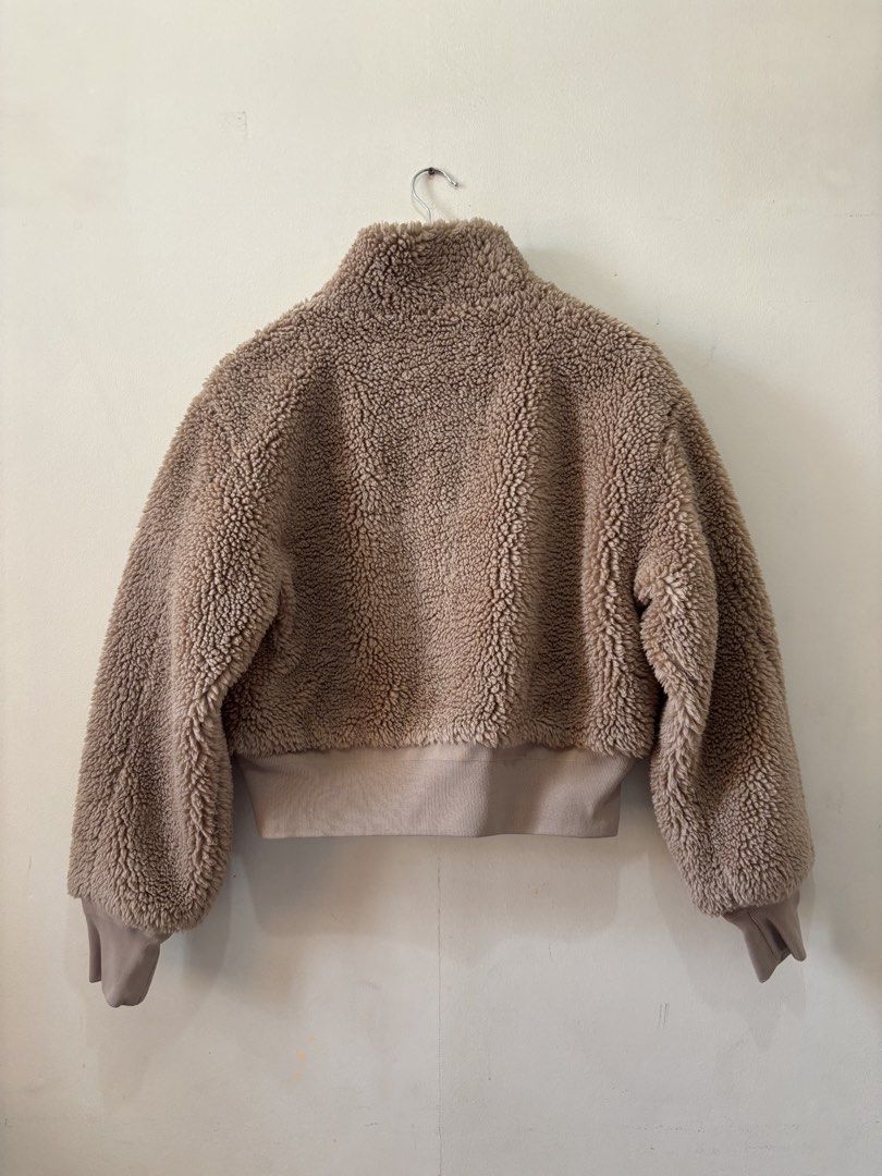 The Group Babaton Teddy Fleece Bomber Jacket Size S (Category: Coats, Jackets and Outerwear) located in Pasig City. Submitted by mariks (Listing ID 1440689543, Image 2). Description: - Super cozy teddy fleece jacket - Brand: The Group Babaton - Style: Cropped bomber - Features: Zip-up front, ribbed cuffs and hem - Ideal for: Layering, cooler weather - Size: S - No issue.