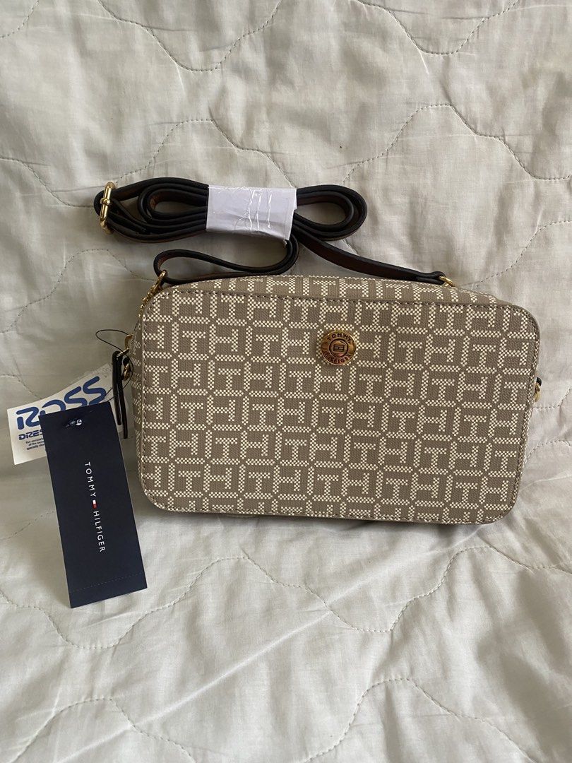 Tommy Hilfiger Monogram Crossbody Bag (Category: Cross-body Bags) located in Quezon City. Submitted by viacb (Listing ID 1440611223, Image 1). Description: mop: gcash mod: jnt/lalamove *location: quezon city.
