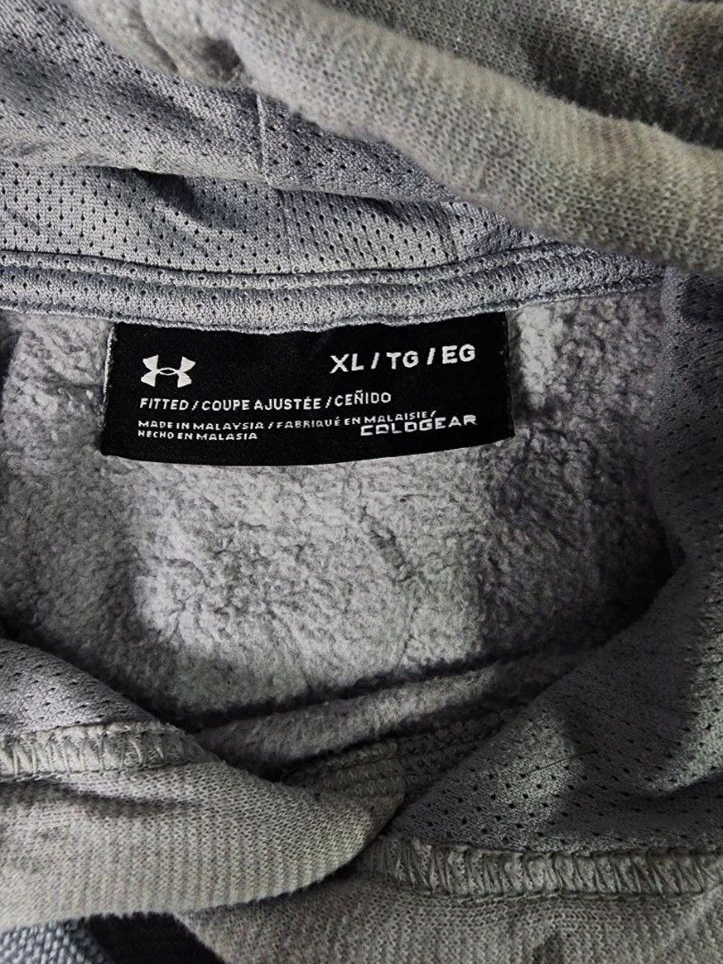 Under Armour Cold Gear Grey Hoodie (Category: Hoodies) located in La Trinidad. Submitted by closetloop2601 (Listing ID 1440707045, Image 2). Description: 200 + SF Size : Extra Large on tag W: 25 in | L: 27 in Good condition Issue: see comment section Color may vary due to lighting.