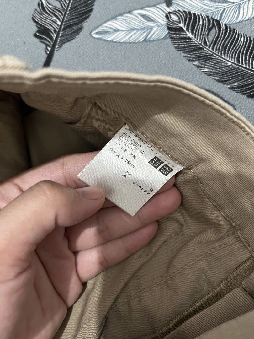 Uniqlo Chino Pants Beige (Category: Other Bottoms) located in Cavite. Submitted by ms.declutzzz (Listing ID 1440709615, Image 3). Description: - Brand: Uniqlo - Color: Beige - Style: Chino Pants - Waist Size: 28-30 - Material: Cotton blend with polyurethane for comfort and stretch - Versatile: Great for casual or smart casual outfits - Easy to pair with various tops - Please check photos for detailed condition.