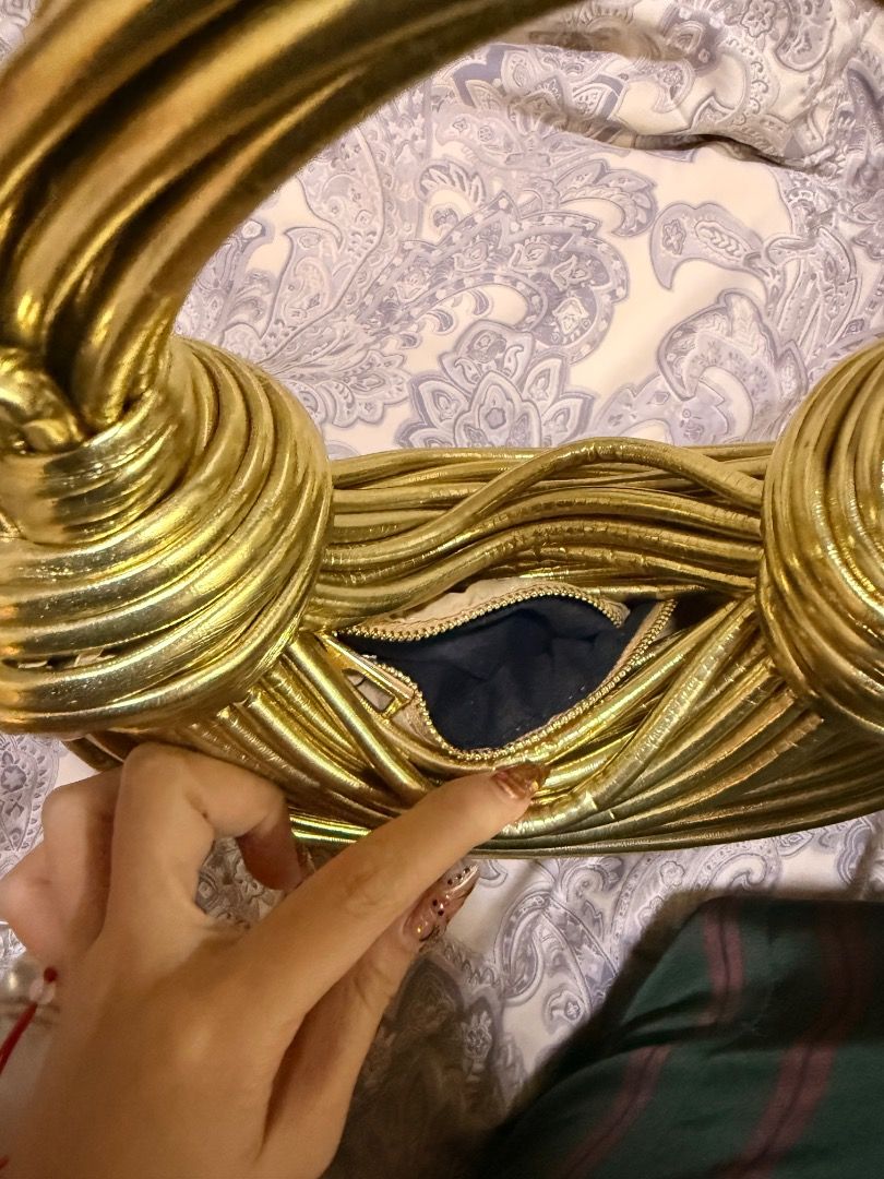 Unique Gold Woven Handbag with Detachable Strap (Category: Purses & Pouches) located in Manila. Submitted by mitch_declutterzzz0713 (Listing ID 1440725564, Image 3). Description: - Like new, used once only - Zipper working, clean bag - Stunning gold handbag with intricate woven design. - Features a secure interior zipper closure. - Comes with a detachable strap for versatile styling (shoulder bag or handle carry). - Elevate any outfit with this e