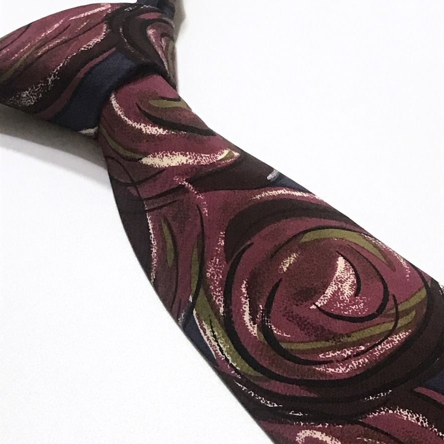 Valo Roso Abstract Florals Hand Made Necktie (Category: Ties) located in Taguig. Submitted by retrogaze (Listing ID 1440742840, Image 1). Description: This Valo Roso handmade necktie is beautifully crafted from 100% silk, showcasing a deep and elegant dark blue base. It features a stunning, artistically bold large abstract painted florals pattern that flows gracefully across the blade. The vibrant botanical motifs combine expressive strokes of ri