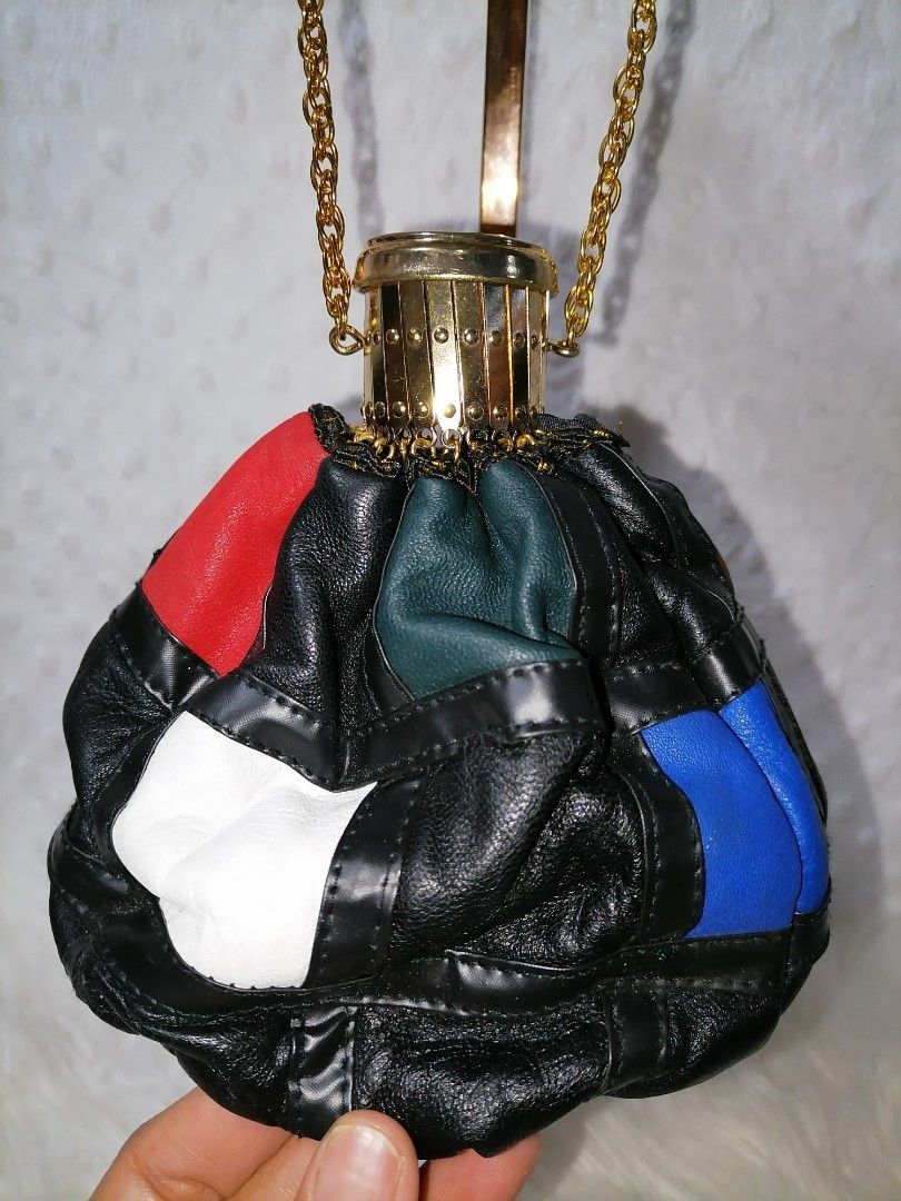 Vintage Rare Leather Patchwork Pouch (Category: Purses & Pouches) located in Butuan. Submitted by az-branded.items (Listing ID 1440667283, Image 2). Description: Size: W-6" x L- 5" bottom- 3" Genuine leather Very unique Comes with free and legit MiuMiu dustbag From Japan.
