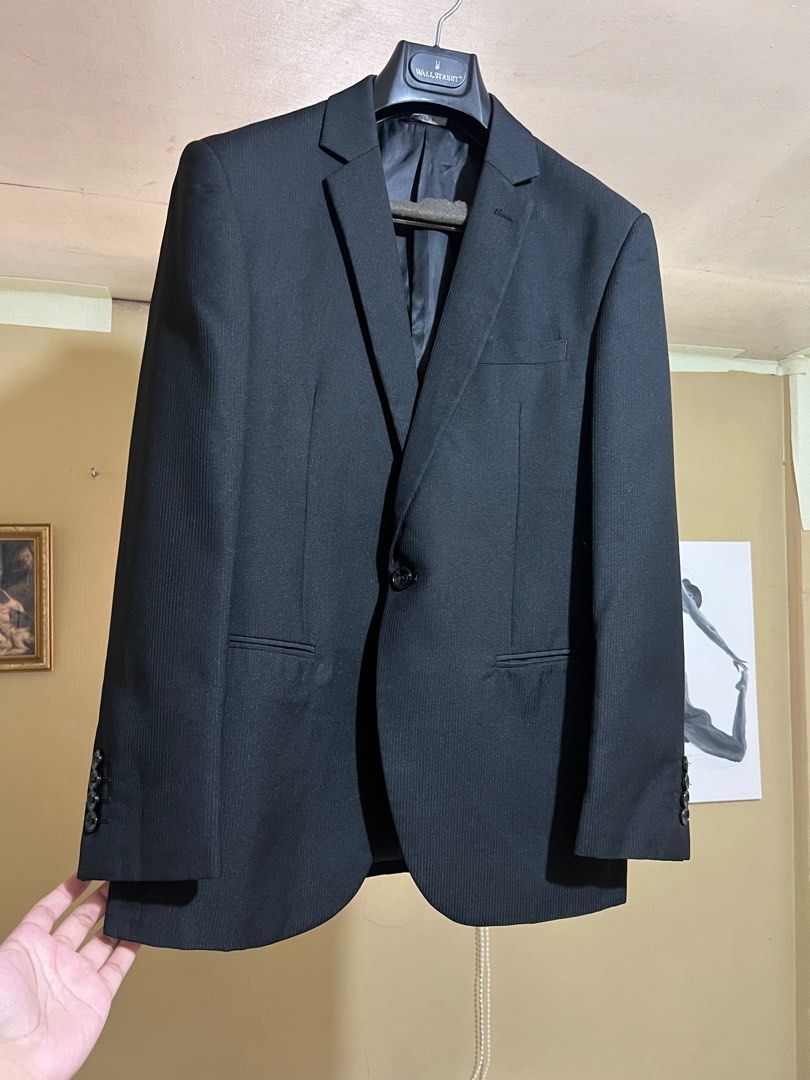 Black Slim Fit Suit Jacket / Blazer for men Black- Wallstreet Brand (Category: Coats, Jackets and Outerwear) located in Caloocan City. Submitted by copinoemhi57494 (Listing ID 1440722490, Image 2). Description: - Black suit jacket from Wall Street - Classic pinstripe pattern - Single button closure - Fully lined interior with internal pockets - Comes with original Wall Street garment bag - Ideal for formal occasions and business attire.