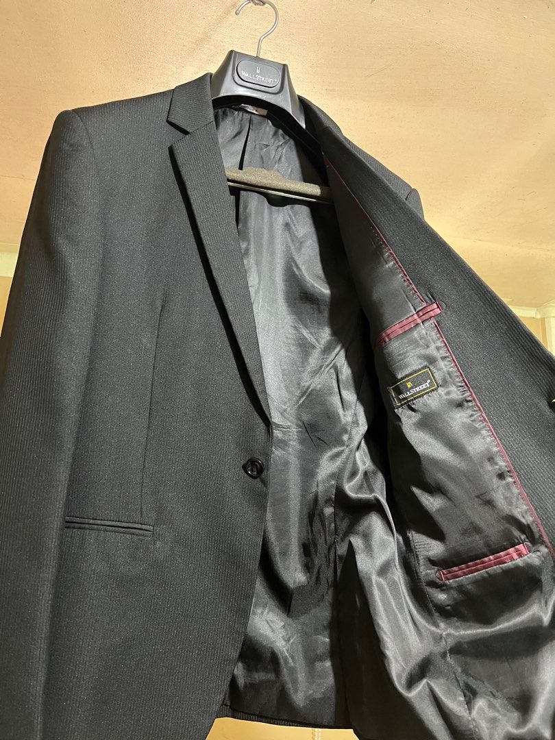 Black Slim Fit Suit Jacket / Blazer for men Black- Wallstreet Brand (Category: Coats, Jackets and Outerwear) located in Caloocan City. Submitted by copinoemhi57494 (Listing ID 1440722490, Image 3). Description: - Black suit jacket from Wall Street - Classic pinstripe pattern - Single button closure - Fully lined interior with internal pockets - Comes with original Wall Street garment bag - Ideal for formal occasions and business attire.