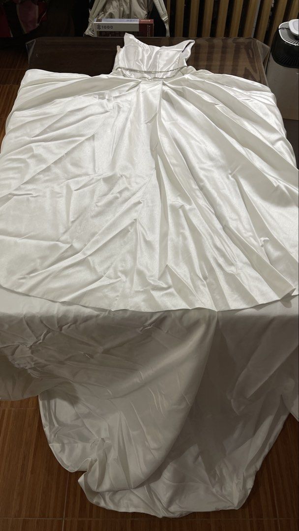 Wedding Gown (Category: Evening dresses & gowns) located in Valenzuela. Submitted by patpeev (Listing ID 1440738860, Image 3). Description: Wedding gown - Used - With petticoat - Dry cleaned - With side pocket - Back zipper Size - Small to Medium - Bust: 30” - Waist: 26” - Neck to waist: 13” - Armhole: 5.5” - Neckline to end: 56” 📍 Marulas, Valenzuela MOP: Cash, GCash, or Maya MOD: Meet up, Lalamove (within NCR) & JNT (outside NCR).