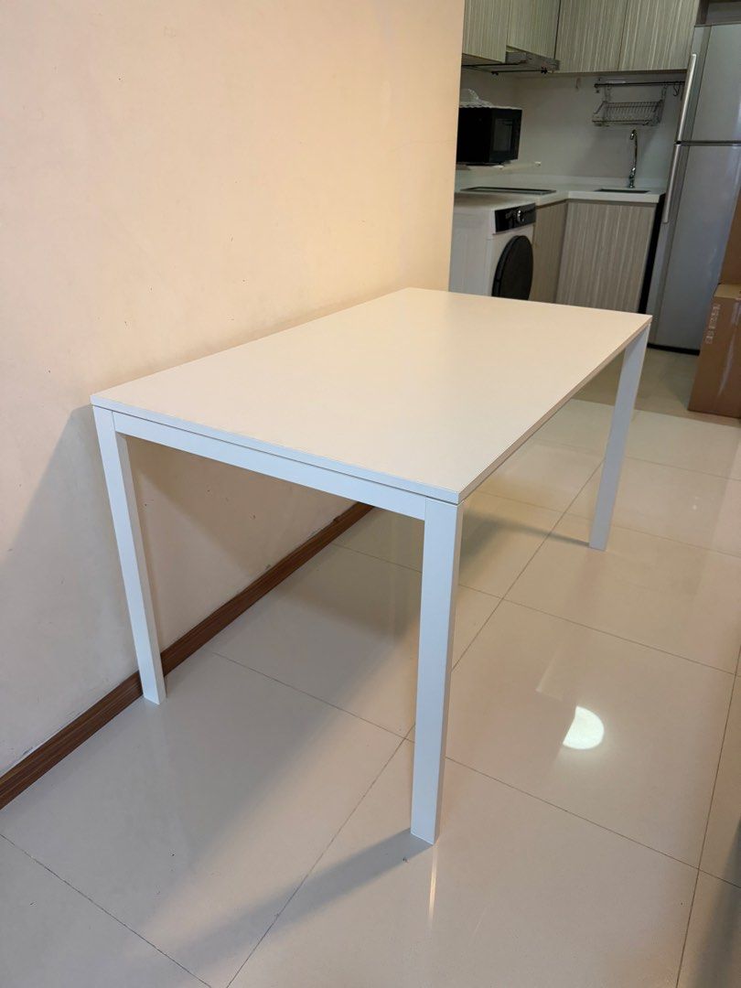White dining study Table (Category: Tables & Sets) located in Singapore. Submitted by glitterxponies (Listing ID 1440616404, Image 1). Description: 125cm x 75cm x 74cm (height) Pick up from Joo chiat 427946. Do arrange own delivery .