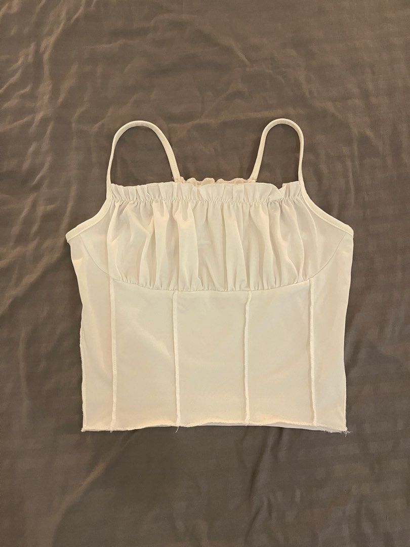 White Ruched Corset Crop Top with Spaghetti Straps (Category: Others Tops) located in Quezon City. Submitted by maxsclosett (Listing ID 1440692740, Image 1). Description: - stretchy can fit xs/s/m - RFS: don’t use.