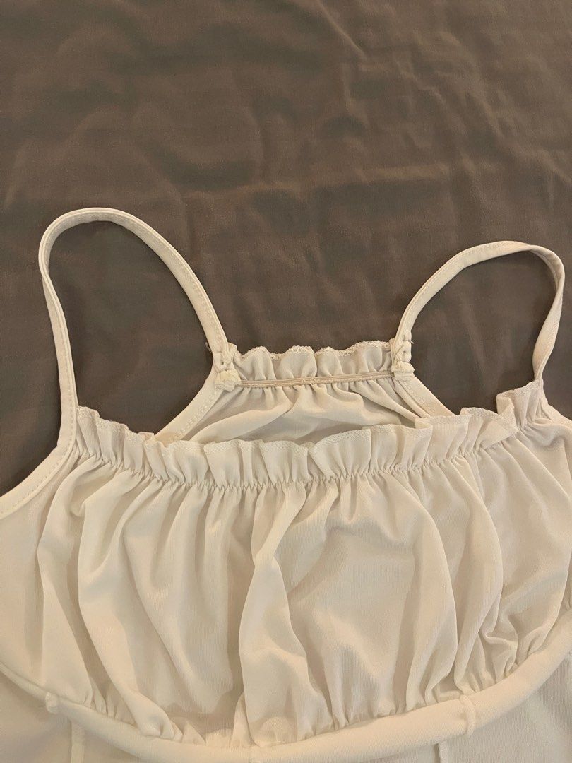 White Ruched Corset Crop Top with Spaghetti Straps (Category: Others Tops) located in Quezon City. Submitted by maxsclosett (Listing ID 1440692740, Image 3). Description: - stretchy can fit xs/s/m - RFS: don’t use.