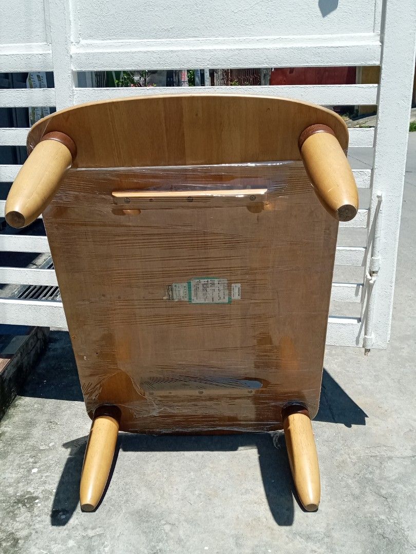 Wooden Coffee Table with Tapered Legs (Category: Tables & Sets) located in Manila. Submitted by mar.nel_1227 (Listing ID 1440754696, Image 3). Description: - Wooden coffee table with rounded edges - Features four tapered wooden legs - Surface has light scratches and wear, adding character - Underside is wrapped in plastic - Ideal for living rooms or lounge areas - Ready for its new home! 41"L x 27"W x 13"H.
