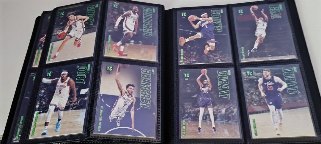 2024 NBA Top Class Base Cards (Category: Raw Singles) located in Los Banos. Submitted by Kiwi83 (Listing ID 1435737659, Image 2). Description: Panini Top Class Base Cards 131/135 Notable Superstars included are: LeBron James Luka Doncic Victor Wembanyama Giannis Antetokuonmpo Steph Curry Anthony Edwards Nikola Jokic Almost complete, missing only 4 cards Cameron Johnson Brandon Miller Joel Embiid Ja Morant All cards are sleeved Binder included Mee