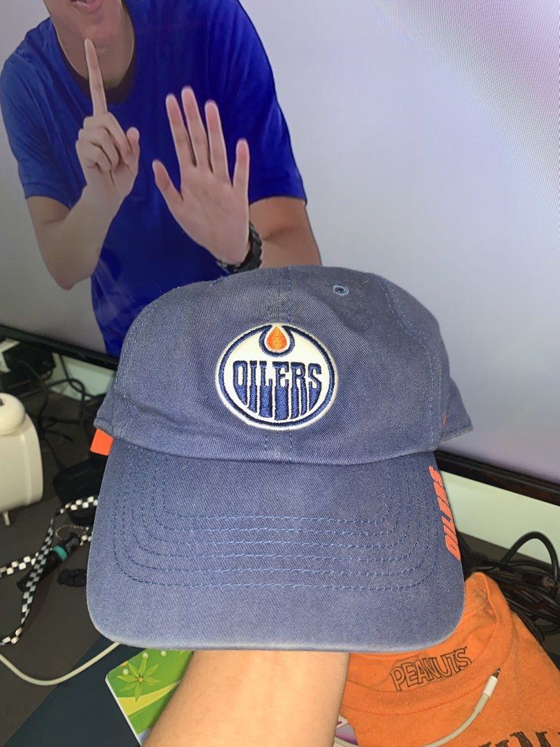 47 Brand Edmonton Oilers Cap (Category: Caps & Hats) located in Mataasnakahoy. Submitted by grailsph.81630 (Listing ID 1435868993, Image 1). Description: - Edmonton Oilers cap - Features the Oilers logo on the front - "EDMONTON" embroidered on the back in orange - '47 brand logo present - Blue cap with orange accents - Includes the '47 brand tag inside.