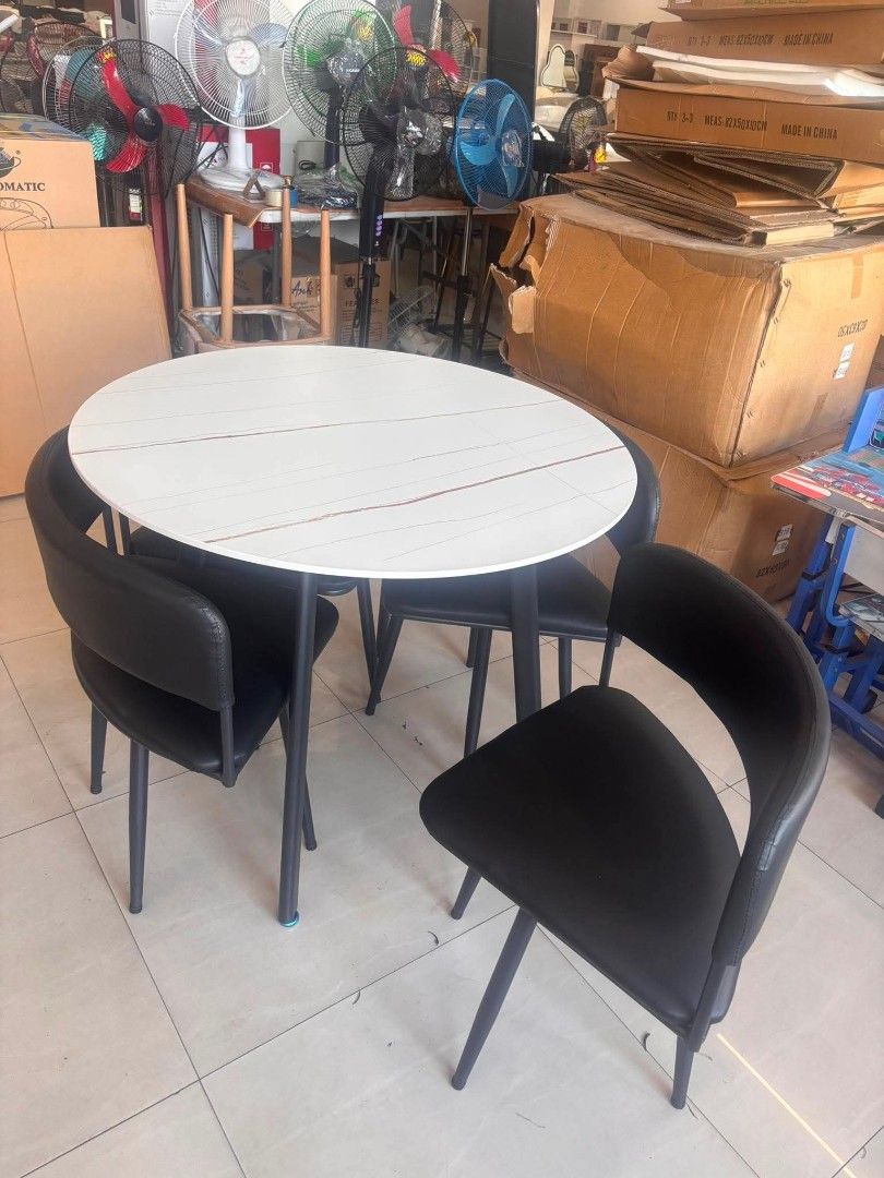 4 Seater Round Table and Chair Set (Category: Tables & Sets) located in Makati City. Submitted by gineth24 (Listing ID 1435725065, Image 3). Description: 4 Seater Sintered Stone Top Table Metal frame leather seat +Sf, may vary per location Pm for inquiries.