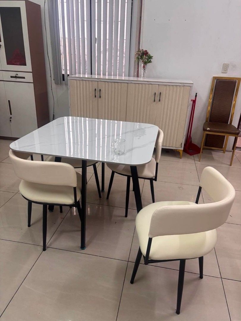 4 Seater Square Dining Table Set (Category: Tables & Sets) located in Makati City. Submitted by gineth24 (Listing ID 1435725238, Image 3). Description: Square 4S Sintered Stone Top Table Metal frame leather seat +Sf, may vary per location Pm for inquiries.