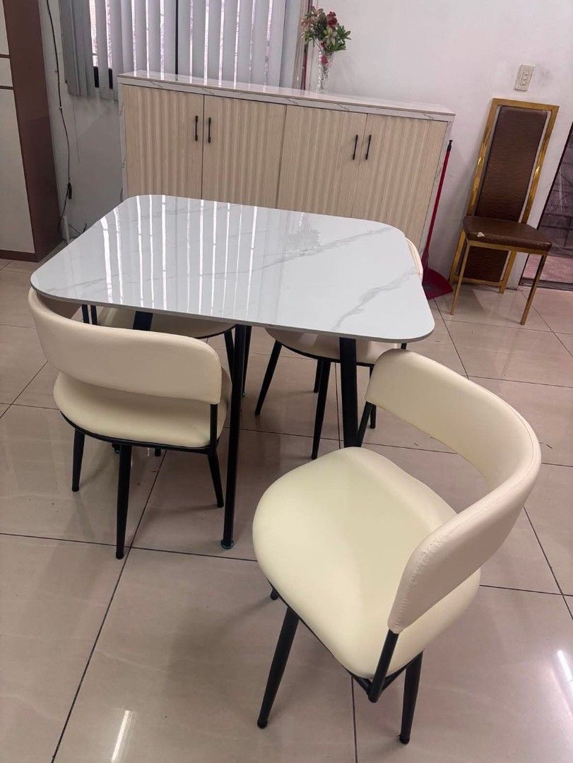 4 Seater Square Dining Table Set (Category: Tables & Sets) located in Makati City. Submitted by gineth24 (Listing ID 1435725238, Image 2). Description: Square 4S Sintered Stone Top Table Metal frame leather seat +Sf, may vary per location Pm for inquiries.