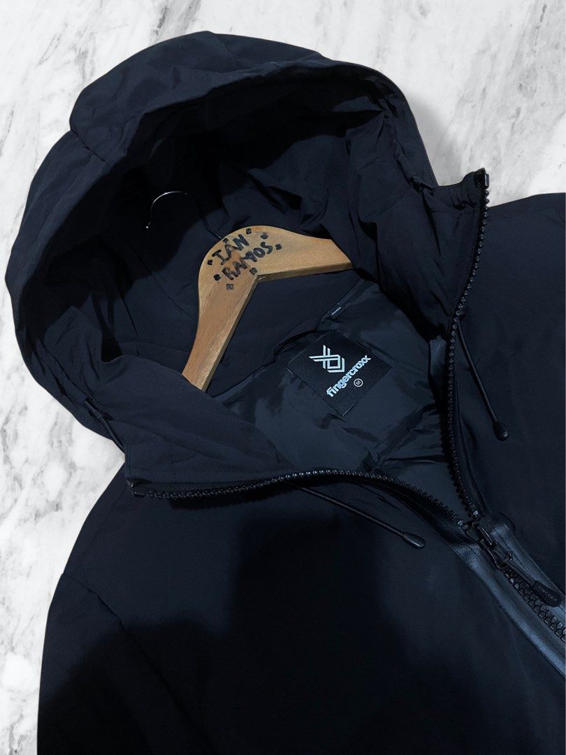 - Black FingerCroxx Puffer Jacket - Color: Navy Blue (Category: Coats, Jackets and Outerwear) located in Manila. Submitted by itsmeian89 (Listing ID 1435842968, Image 2). Description: - Black FingerCroxx Puffer Jacket - Color: Navy Blue - Size: Medium Features a full-length zipper, two side pockets, and elastic cuffs. The jacket has the FingerCrossx logo on the chest and a label inside with care instructions. The jacket has a quilted lining and d