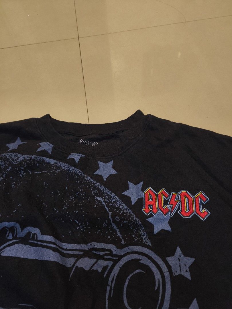AC/DC Cannon Longsleeve XL (Category: Tshirts & Polo Shirts ) located in Taytay. Submitted by Rakeeeem (Listing ID 1435717714, Image 2). Description: - AC/DC t-shirt - Black color - Size: XL - Graphic: Cannon on front, AC/DC logo on chest - Material: Cotton/Polyester blend - Crew neck - Made in China.