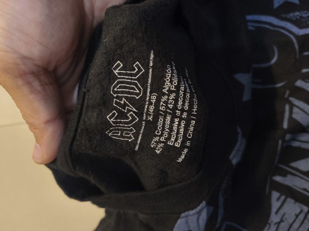 AC/DC Cannon Longsleeve XL (Category: Tshirts & Polo Shirts ) located in Taytay. Submitted by Rakeeeem (Listing ID 1435717714, Image 3). Description: - AC/DC t-shirt - Black color - Size: XL - Graphic: Cannon on front, AC/DC logo on chest - Material: Cotton/Polyester blend - Crew neck - Made in China.