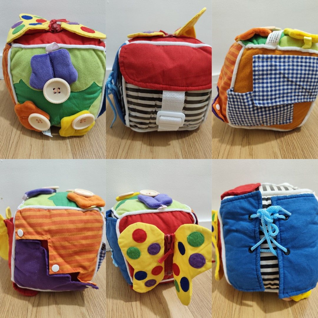 Activity Dice "cube" (Category: Infant Playtime) located in Cavite. Submitted by mdrjtb (Listing ID 1435878816, Image 1). Description: Small foot Baby "cube", soft-lined with various locking functions to discover.