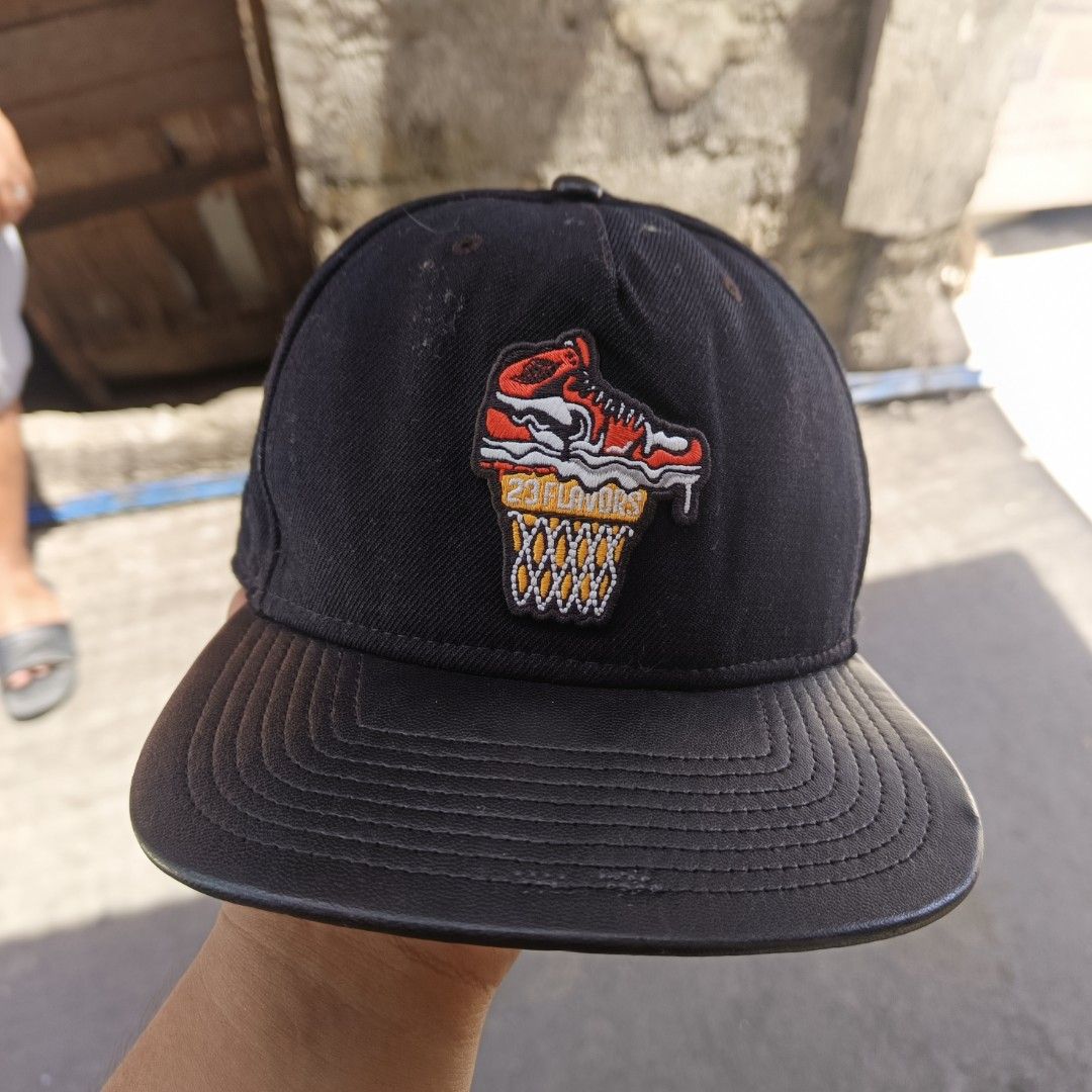 Air Jordan Sundae League Cap (Category: Caps & Hats) located in Santa Cruz. Submitted by fiercegem_1ef7ea (Listing ID 1435756358, Image 1). Description: - Black cap with embroidered basketball shoe and hoop design. - Features "Air Jordan Sundae League" embroidery on the back. - Snapback closure for adjustable fit. - Includes Jumpman logo tag inside. - "Jumpman" printed on inner lining..
