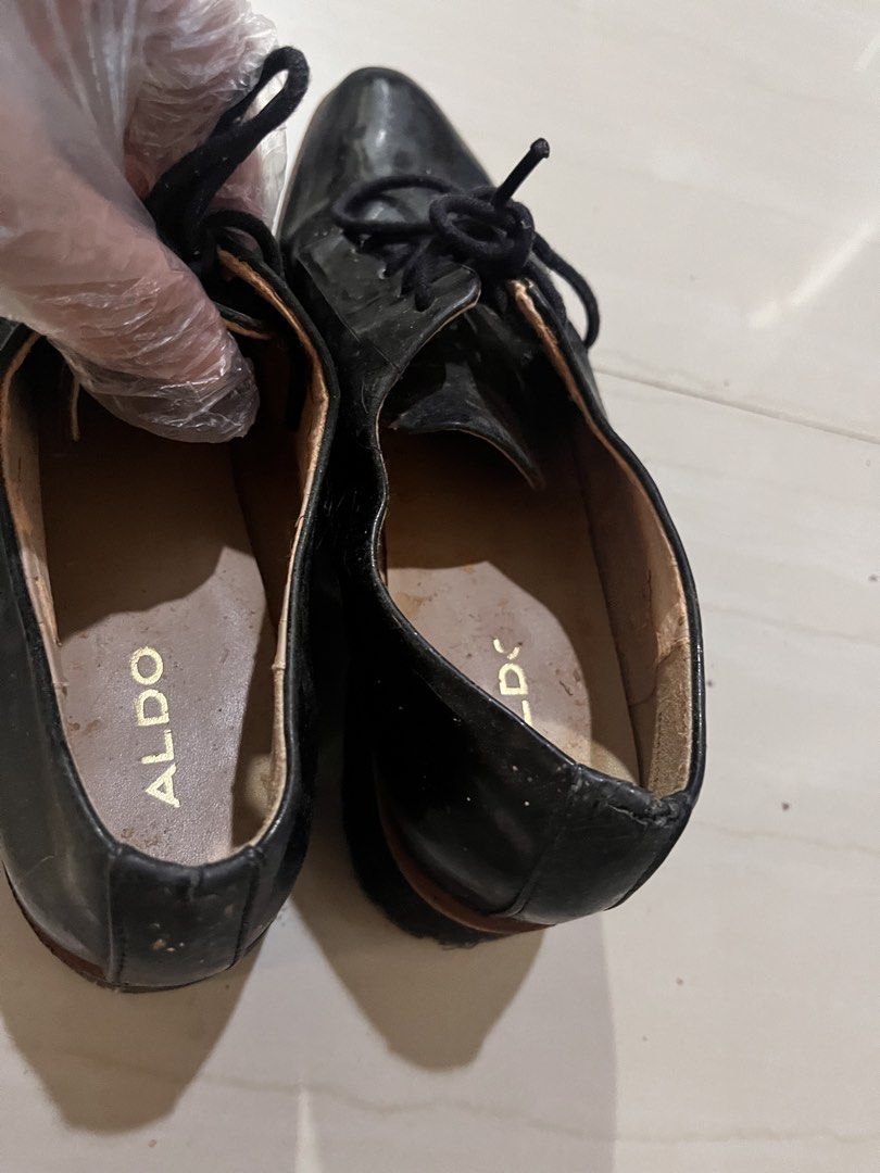 Aldo Black Platform Shoes (Category: Heels) located in Rizal. Submitted by authenticity17 (Listing ID 1435826649, Image 2). Description: - Aldo black platform shoes - Lace-up style - Glossy finish - Platform sole - Features Aldo logo on insole - Pre-owned.