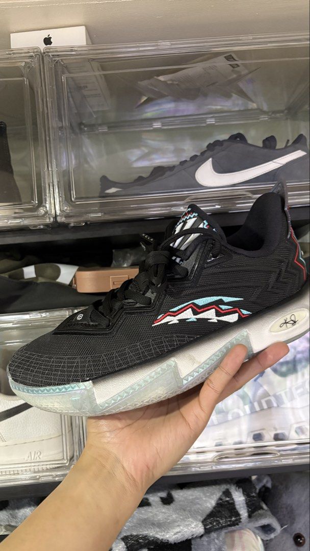 ANTA Kai 2 (Category: Sneakers) located in Manila. Submitted by rakerkase119706 (Listing ID 1435852303, Image 2). Description: - ANTA Lakota basketball shoes - Black colorway - Textured upper design - White and icy blue sole - Unique side and sole pattern - Black laces.