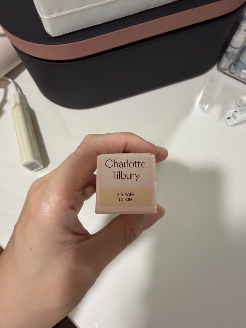 Authentic Charlotte Tilbury Mini Hollywood Flawless Filter 2.5 (Category: Makeup) located in Manila. Submitted by act92 (Listing ID 1435857662, Image 2). Description: - Charlotte Tilbury Hollywood Flawless Filter - Shade: 2.5 Fair Clair - Size: 5.5 ml / 0.18 fl. oz. - Achieve a superstar glow! - Packaging: Light pink box with gold accents; clear bottle with gold cap. Like new! Only swatched once, at the back of my hand only, not on my face. Authe