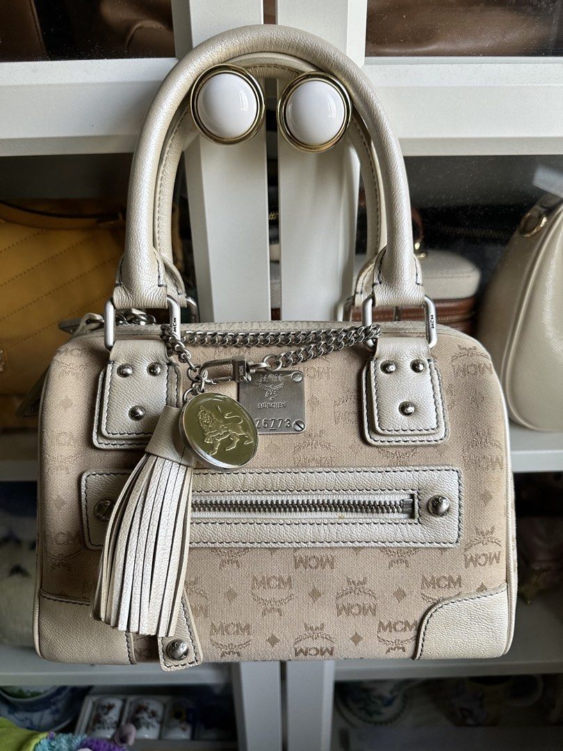 Authentic MCM handbag with bag charm (Category: Luxury Bags & Wallets) located in Mandaluyong City. Submitted by secondsnlabels (Listing ID 1435798652, Image 1). Description: .