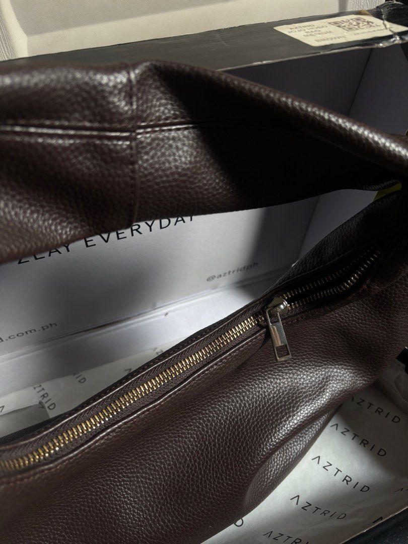 Aztrid Hobo Bag Medium in Brown (Category: Luxury Bags & Wallets) located in Manila. Submitted by declutterwithroycie (Listing ID 1435751600, Image 3). Description: aztrid hobo bag in medium (brown) see photos for condition with dust bag and box .