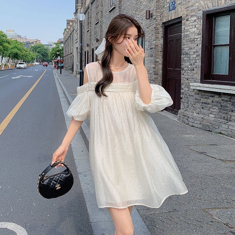 Barley Strapless Linen Dress (Category: Dresses) located in Pasay City. Submitted by wuangel_ (Listing ID 1435822670, Image 2). Description: beige color fit to S-M strapless style featuring distinctive balloon-hem sleeves and a ruffled, pleated neckline. Linen Fabric.