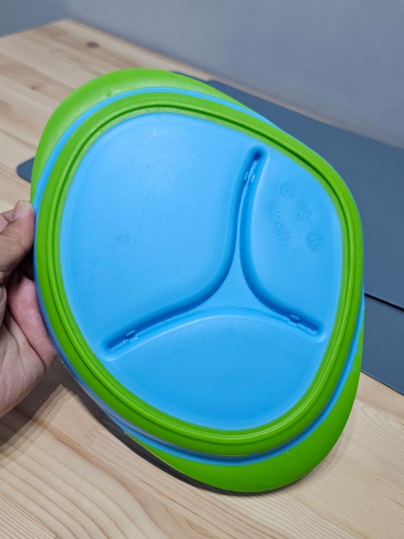 b.box Divided Plate (Category: Other Kitchenware & Tableware) located in Manila. Submitted by bonitalamama (Listing ID 1435726400, Image 2). Description: - B.box divided plate, ideal for toddlers. - Features a vibrant blue center and green rim. - Designed with three sections to separate food. - Made from durable, easy-to-clean plastic. - Perfect for mealtimes at home or while traveling..