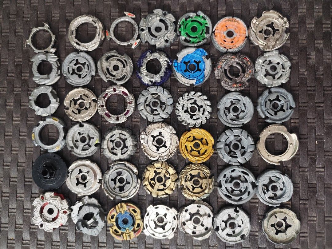 Beyblade burst and metal fight Lots for sale (Category: Action & Battle Toys) located in Victoria. Submitted by oseisan10249776 (Listing ID 1435885592, Image 3). Description: may mga markings yung launchers layers ng burst legit metal fight di ko na chineck kung legit or hindi, AS IS, kayo na po bahala lahat ng nasa picture kasama na.