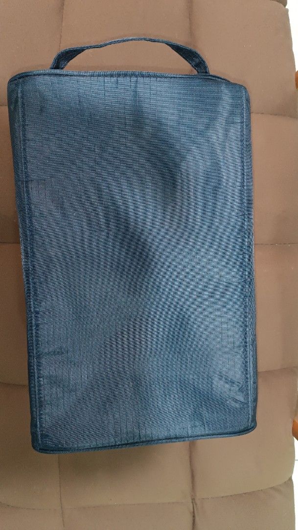 Blue Travel Organizer Bag (Category: Belt bags, Clutches and Pouches) located in Manila. Submitted by rmflores888 (Listing ID 1435810292, Image 2). Description: - Blue travel organizer bag - Rectangular shape with a handle - Features multiple zippers for secure storage - Made of durable, potentially water-resistant material - Compact design for easy carrying - Perfect for travel or organizing essentials.