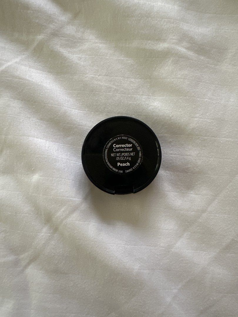 Bobbi Brown Corrector - Peach (Category: Makeup) located in Quezon City. Submitted by my.arte (Listing ID 1435771372, Image 2). Description: 50% left - Bobbi Brown Corrector in Peach - Compact with mirror - Black compact with Bobbi Brown logo - Peach-colored concealer - Net weight: 2.0g/0.07 oz.