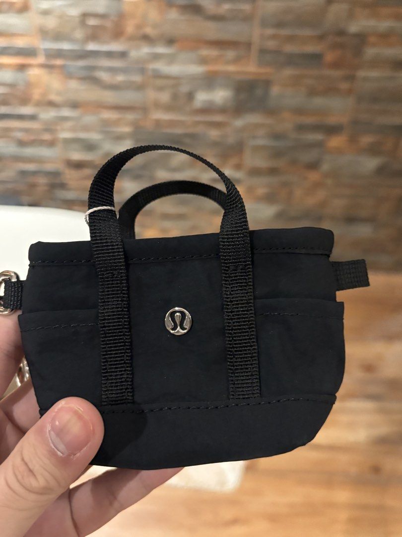 [BRAND NEW] Lululemon Multipocket Nano Tote Wallet (Category: Luxury Bags & Wallets) located in Manila. Submitted by ponyo111 (Listing ID 1435874976, Image 1). Description: - Bought in Japan - Unused with tags - Unique style and rare to find Rfs: Don’t want anymore.