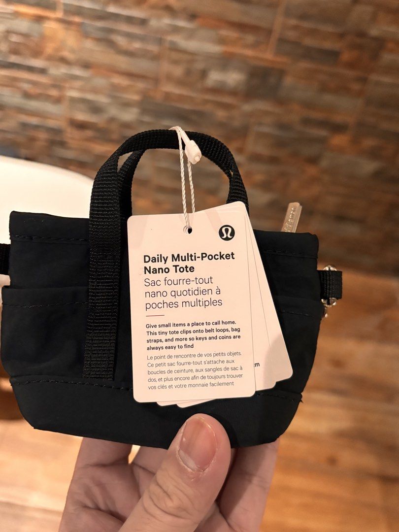 [BRAND NEW] Lululemon Multipocket Nano Tote Wallet (Category: Luxury Bags & Wallets) located in Manila. Submitted by ponyo111 (Listing ID 1435874976, Image 2). Description: - Bought in Japan - Unused with tags - Unique style and rare to find Rfs: Don’t want anymore.