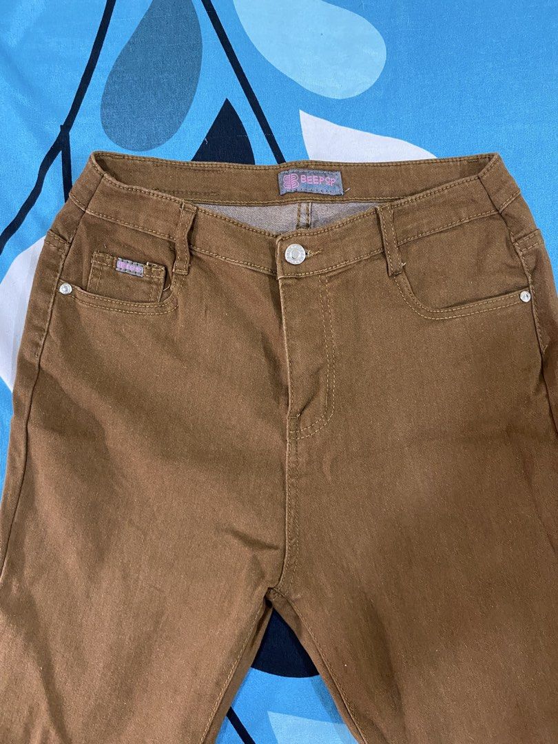 Brown Flare Jeans (Category: Jeans) located in Makati City. Submitted by beaa24 (Listing ID 1435805111, Image 1). Description: Had it altered to fit 29-30 inches waist and shorter length. Stretchable fabric. Used twice. High waisted, above navel.