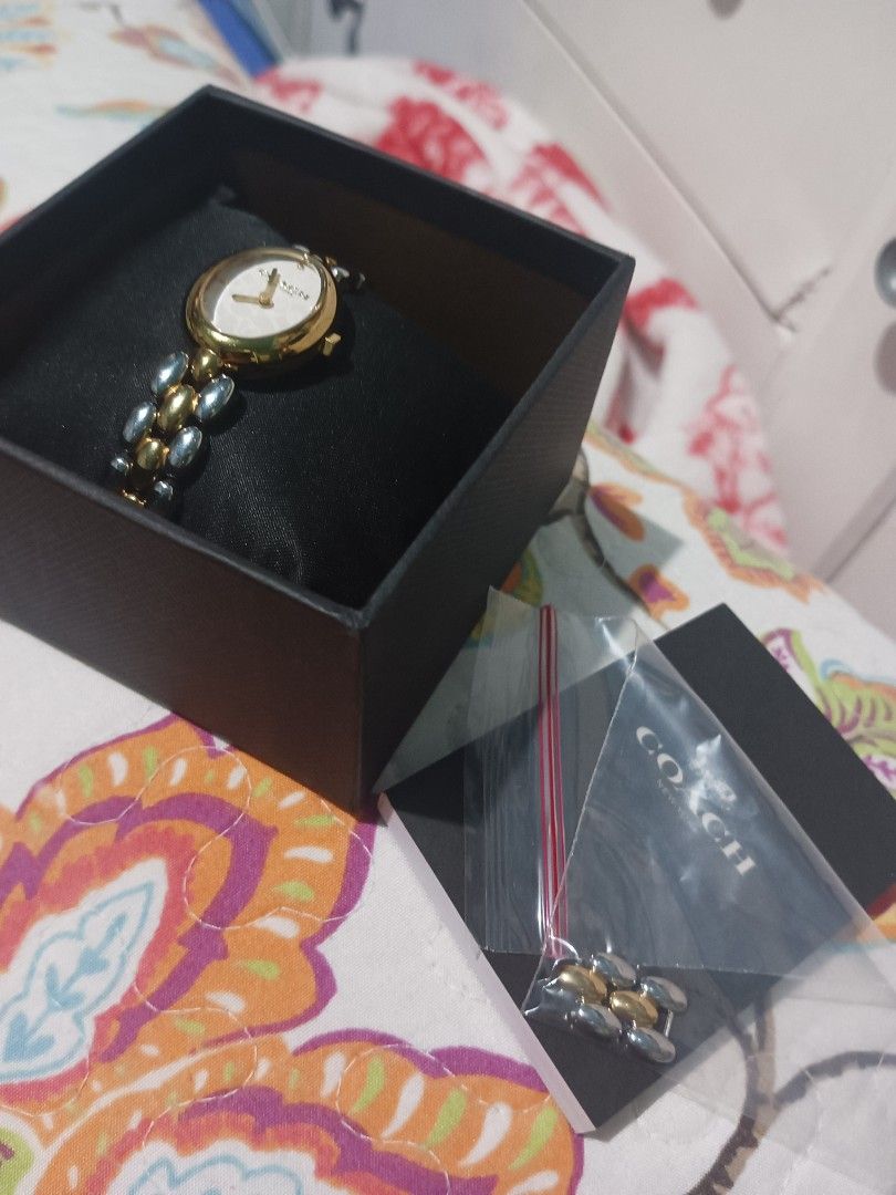 Coach Sammy Watch in two tone 22mm (Category: Women's Watches) located in Manila. Submitted by justonemor27277 (Listing ID 1435714961, Image 1). Description: Retail price is 15.3k pesos used but not abused, it could pass as like new pa. Sale !!! Price AS IS, free sf na po ito :)) and with the complete original package. you can adjust the watch, the spare is included. very chic and dainty for your everyday agenda. maganda ito in person, the camera