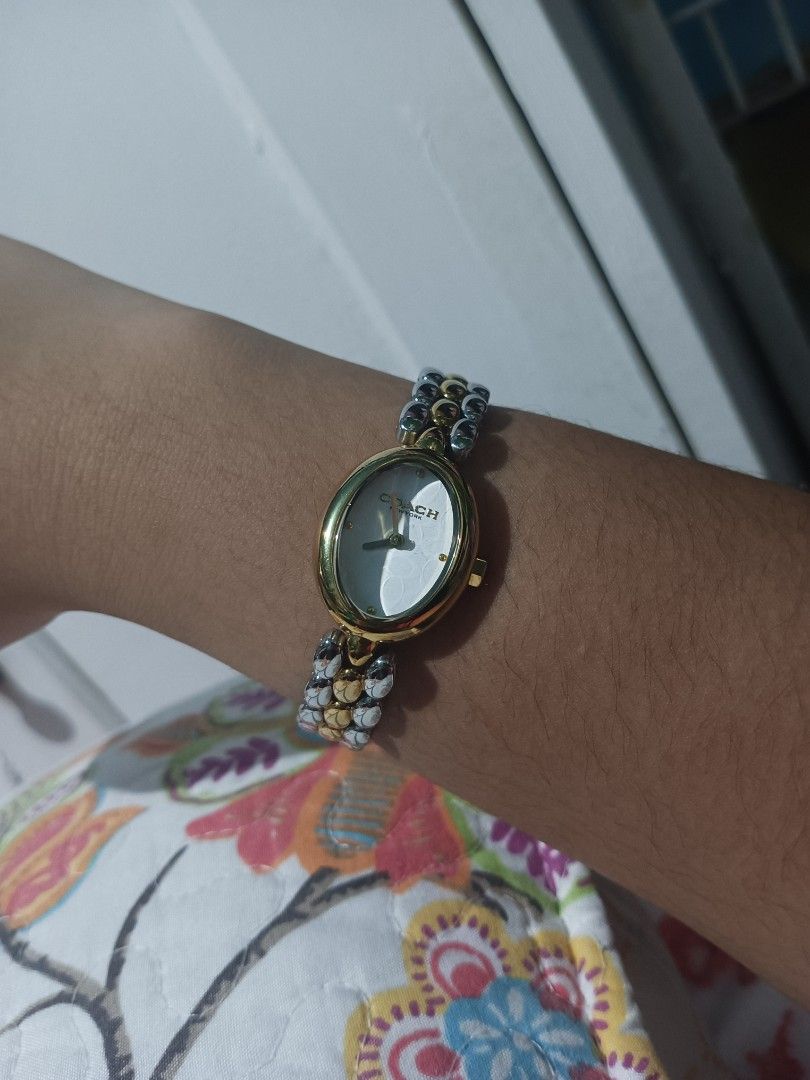 Coach Sammy Watch in two tone 22mm (Category: Women's Watches) located in Manila. Submitted by justonemor27277 (Listing ID 1435714961, Image 3). Description: Retail price is 15.3k pesos used but not abused, it could pass as like new pa. Sale !!! Price AS IS, free sf na po ito :)) and with the complete original package. you can adjust the watch, the spare is included. very chic and dainty for your everyday agenda. maganda ito in person, the camera