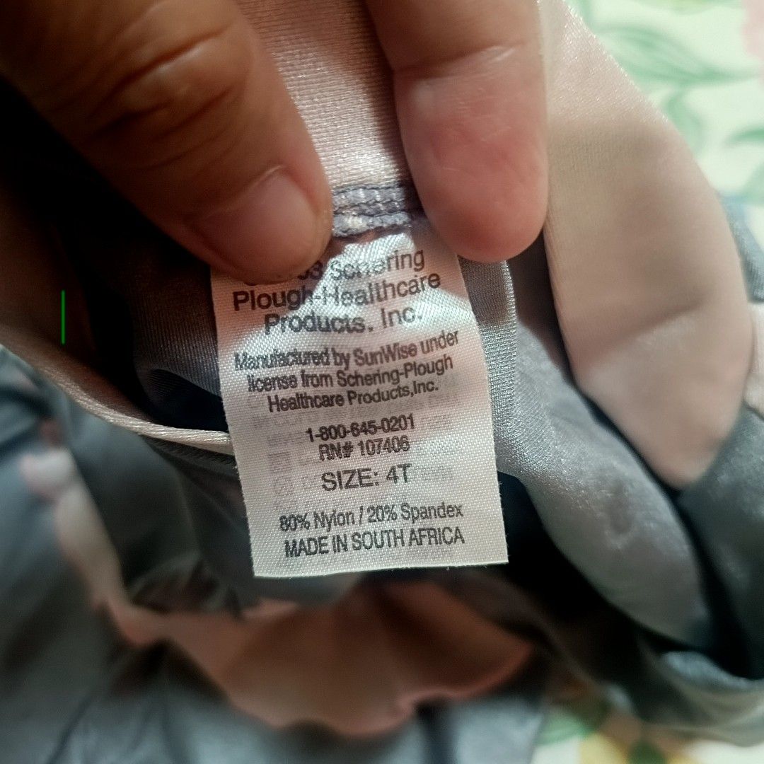 Coppertone Kids Swimsuit - Size 4T (Category: Babies & Kids Fashion) located in Famy. Submitted by ljcastejon (Listing ID 1435750002, Image 3). Description: - Coppertone Kids swimsuit - Size: 4T - Color: Gray and pink - Design: Full-body - Closure: Zipper - Material: 80% nylon, 20% spandex - Manufacturer: SunWise - Made in South Africa.