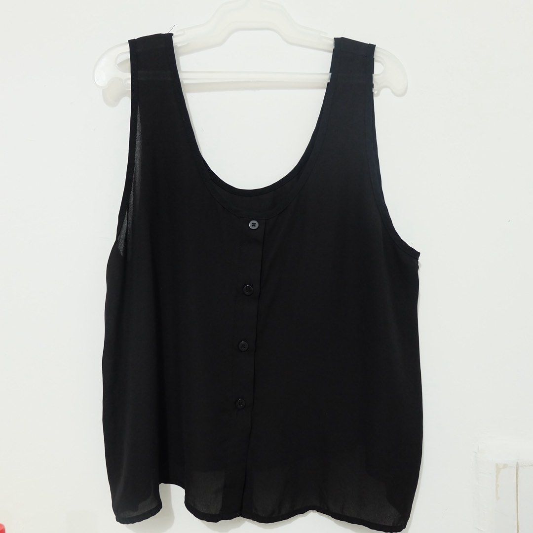 Cotton On Black Sleeveless Button-Back Top (Size L) (Category: Sleeveless) located in Manila. Submitted by thecooldeclutterer (Listing ID 1435859231, Image 1). Description: • Brand: Cotton On • Size: Large (L) • Color: Solid Black • Style: Lightweight sleeveless tank with a scoop neckline and functional button-down back detail • Origin: Designed in Australia; Made in China KEYWORDS Cotton On, Large, Black, Tank, Sleeveless, Button-Back, New, Mini